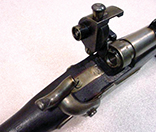 Joslyn carbine; single shot, rimfire .56 caliber cartridge, patented in 1863 by B. F. Joslyn, swinging breechblock design. From Our Rifles by Sawyer.